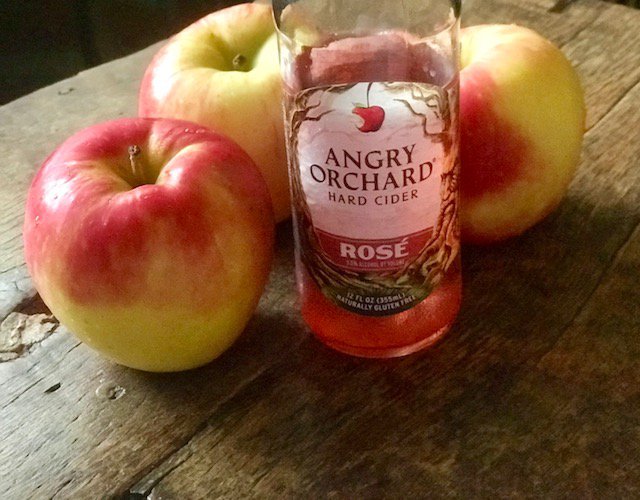 Optimized-Angry Orchard cider with apples.jpg
