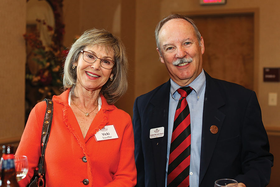 Ray Leven, right, started teaching as an adjunct at Roanoke College after a lengthy legal career. He’s pictured at a 2019 campus reception.