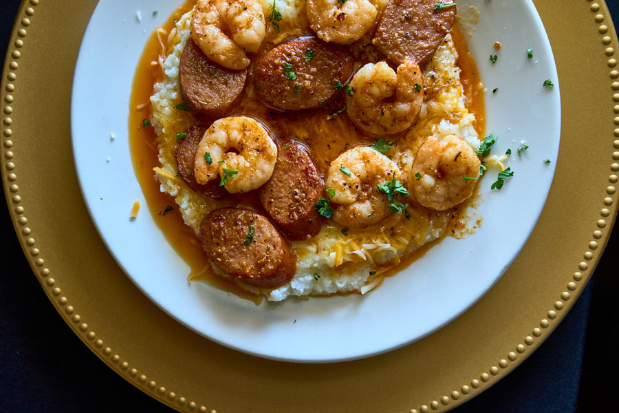 A classic shrimp and grits with andouille sausage will hit the spot!