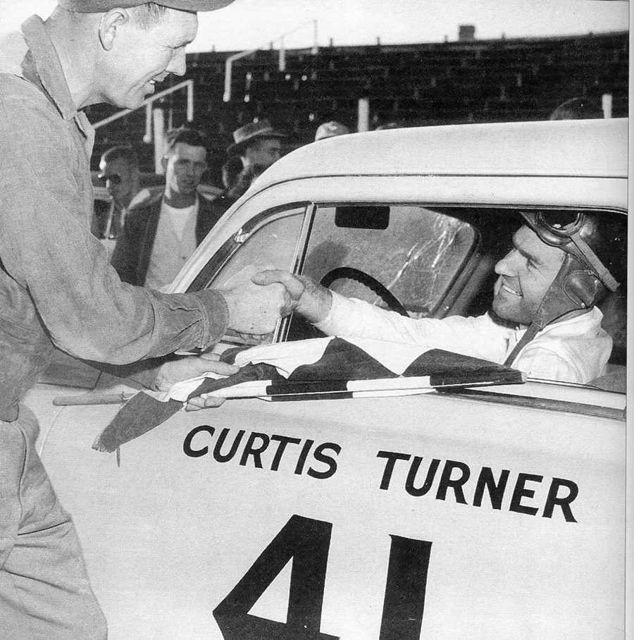 Bill France congratulates Curtis Turner on a victory, undated.