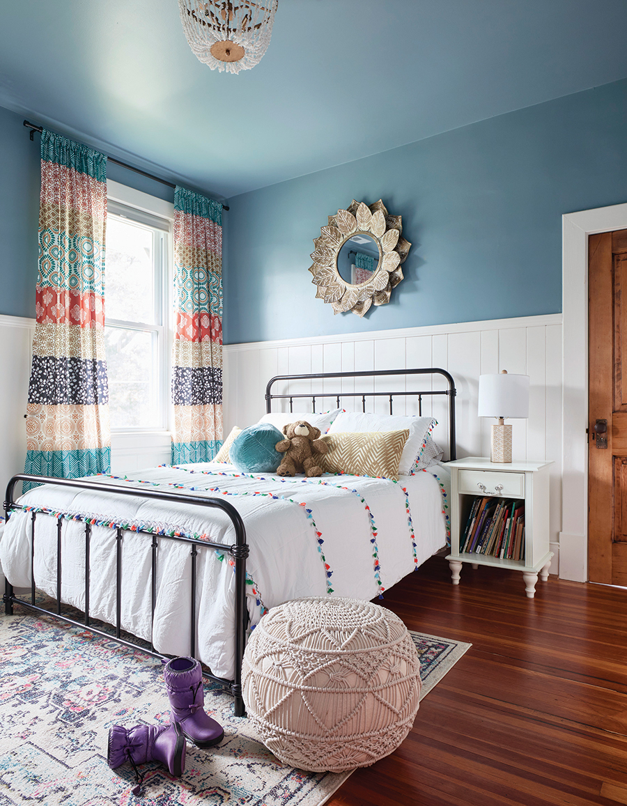 Ben and Amanda’s daughter, Adrienne, told them, “I want blue everywhere!” when they moved into this home. CIRCLE honored this request by even painting the ceiling blue.