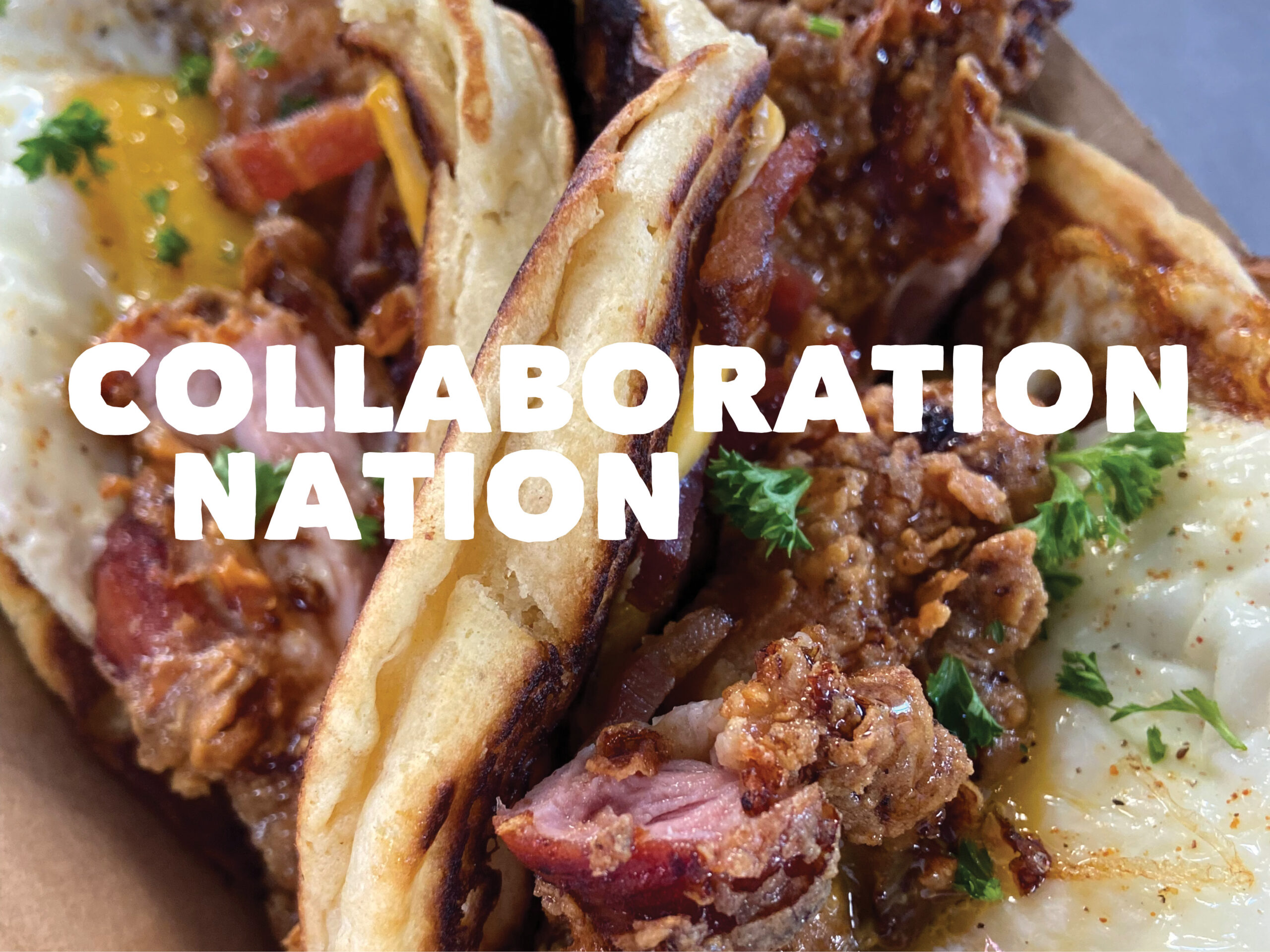 Breakfast Tacos featuring buttermilk pancakes, American cheese, sweet tea fried chicken, bacon and a runny egg.