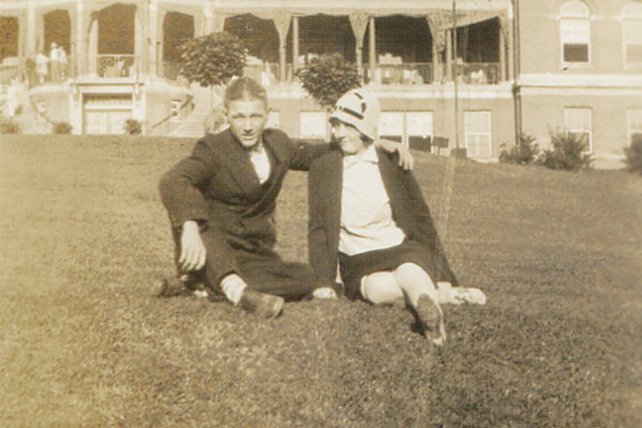 Dee Gish and an unidentified male on the front lawn of Hill Crest, ca. 1930s.