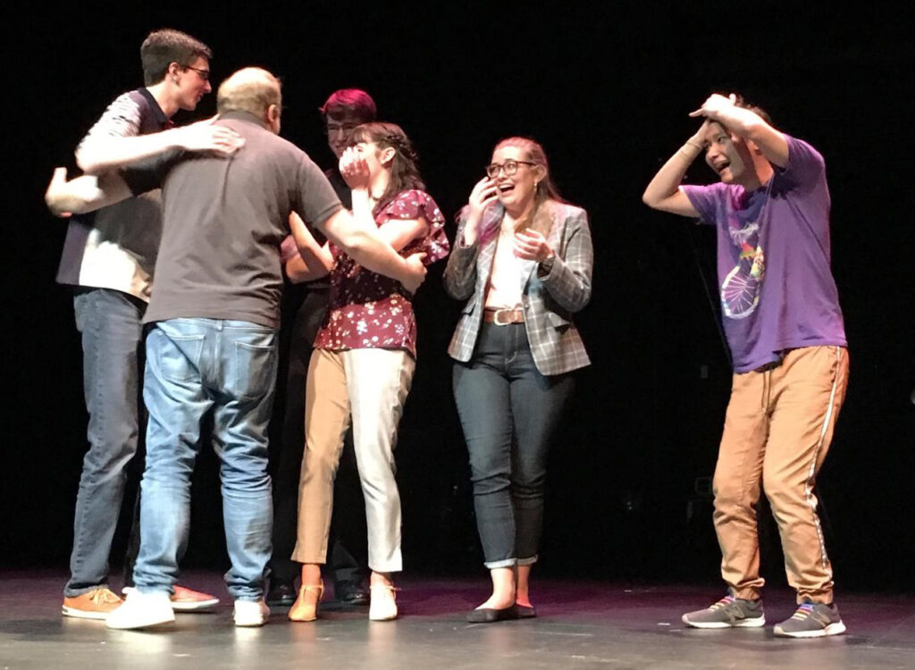The Roanoke College Theatre troupe reacts to Hunter Bell's surprise attendance of their show.