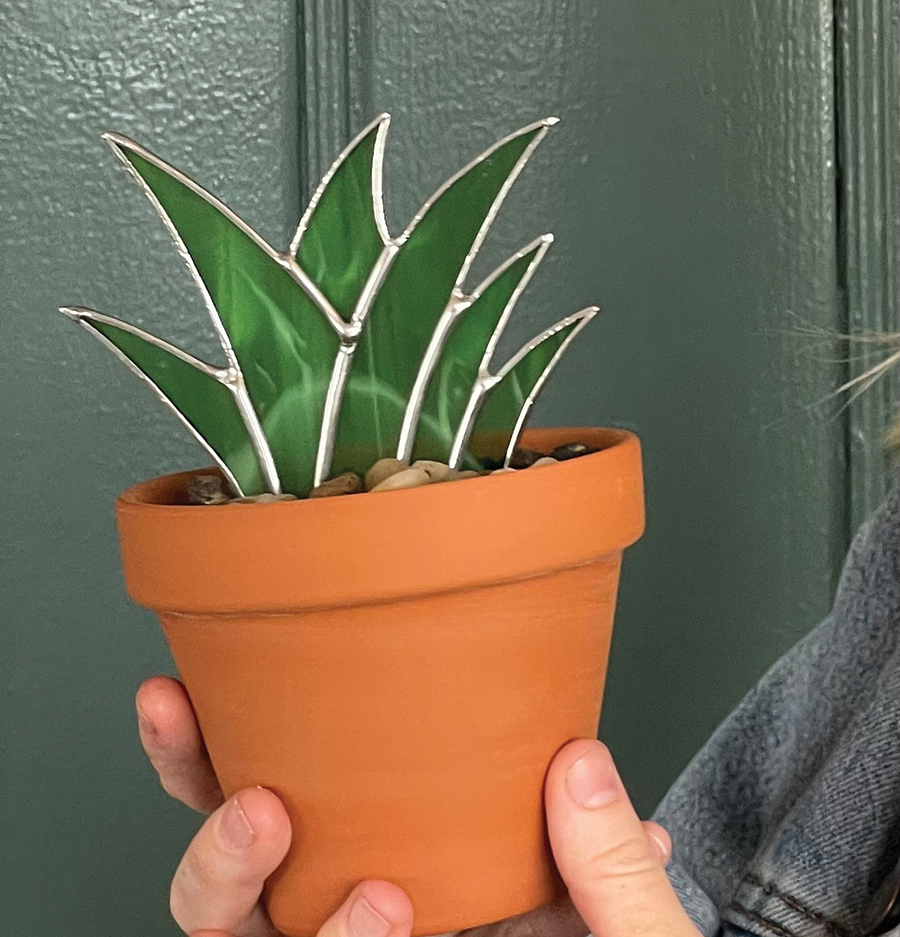This adorable stained glass plant is just one of many pieces made by Gillette.