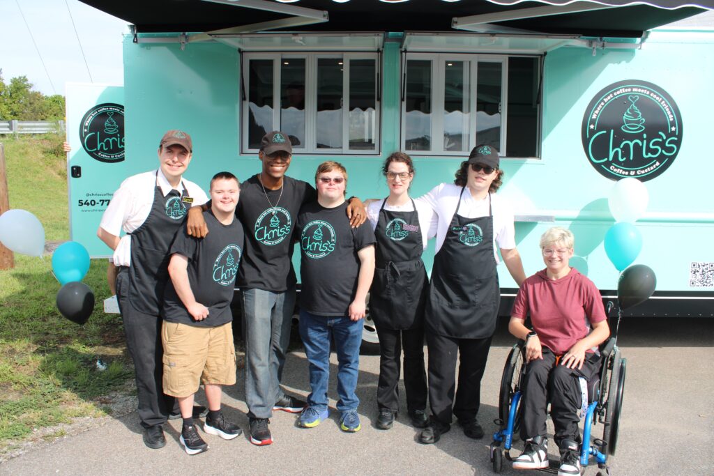 Chris Woodrum and friends celebrate the opening of new custard truck.