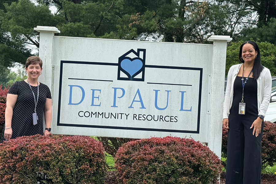 Melissa Cook and Trista Thompson stand in front of DePaul’s building on Hollins Road in Roanoke.
