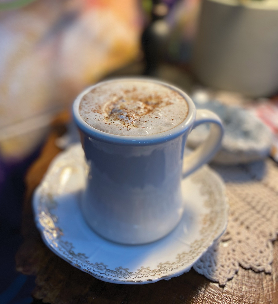 An adaptogen-infused latte capped with coconut whip.