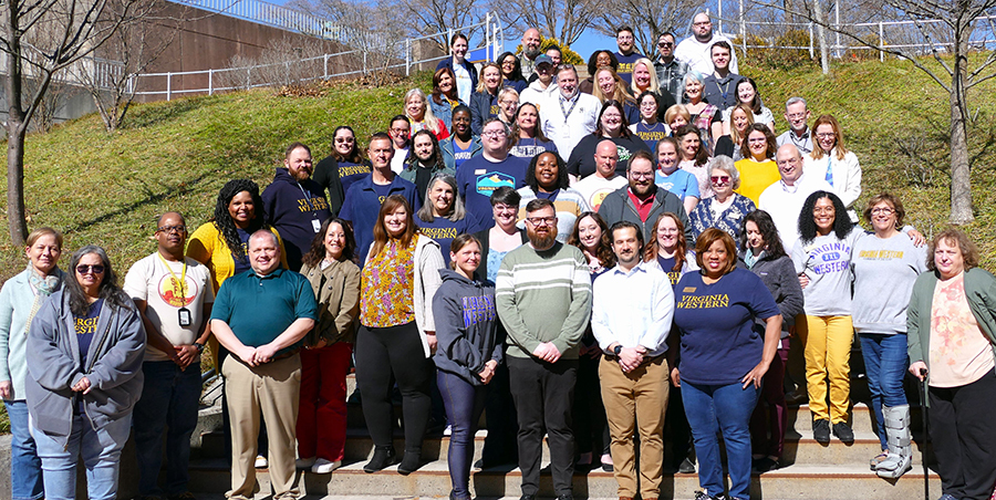 A cross-section of Virginia Western staff, faculty and administrators assembled during the College’s Spring Break for CLEAR Coaching offered by the firm InsideTrack. Patrick Boye (front, in striped sweater) and Ben Smith (in white shirt), InsideTrack trainers, are flanked by AVP of Institutional Effectiveness, Dr. Jolene Hamm, and VP of Student Affairs Bernadette “Bern” Battle. CLEAR stands for Confirm, Legitimize, Evaluate, and Respond.