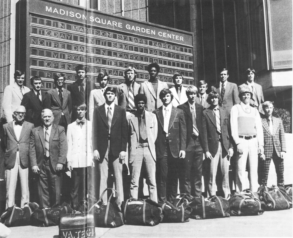 Just before the big game.
Madison Square Garden marquee tells the story as Tech prepares to take on Notre Dame for the 1973 NIT championship. Back row, left to right: Asst. Coach Sonny Smith, Asst.Coach Jim Hallihan, Student Trainer Blaine Jackson, Asst. Coach Bob Andrews, Tim Harvey, Jimmy Allen, Calvin Wade, Dave Sensibaugh, Student Trainer Danny Roberts, Head Coach Don De Voe, Ed Frazier; Front row, left to right: Team Physician Dr. Irwin, Head Trainer Ed Motley, Equipment Manager Buster Smith, John Payne, Charlie Thomas, Geoff Wiggins, Kyle McKee, Craig Lieder, Alan Bristow, Bobby Stevens.