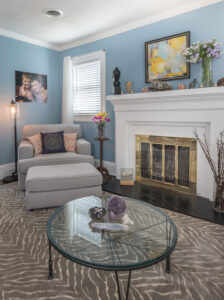 The Family Room: The styles, shapes, colors and textures work together for an aesthetically pleasing grouping.