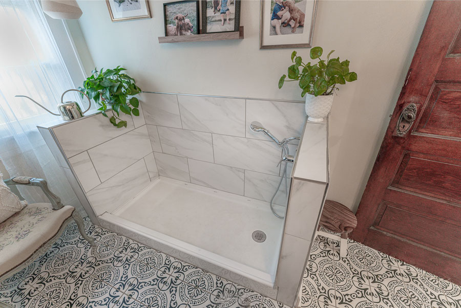 The step-in dog-washing station is ideal for taking care of their Golden Retriever.