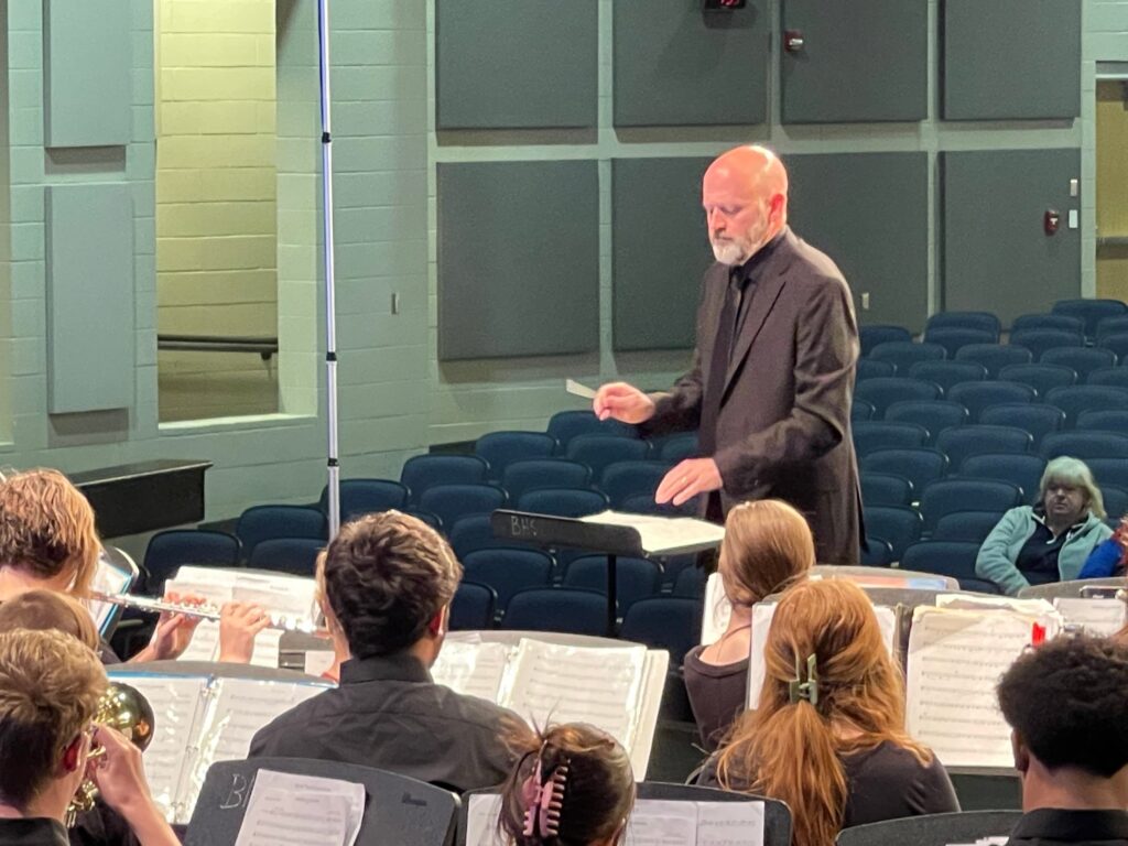 Christopher Caldwell prepares to direct his band.