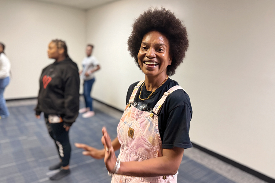 CommUNITY ArtsReach volunteer Semelle Ramsey teaches choreography for the ministry’s annual Nativity performance. She says it is important for youth to see people who look like them, who know how to laugh and have a good time.