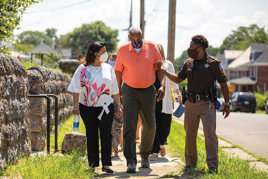 Dr. White participates in a listening tour in the community after she became superintendent in 2020. Sheriff Hash was a deputy and SRO at the time.