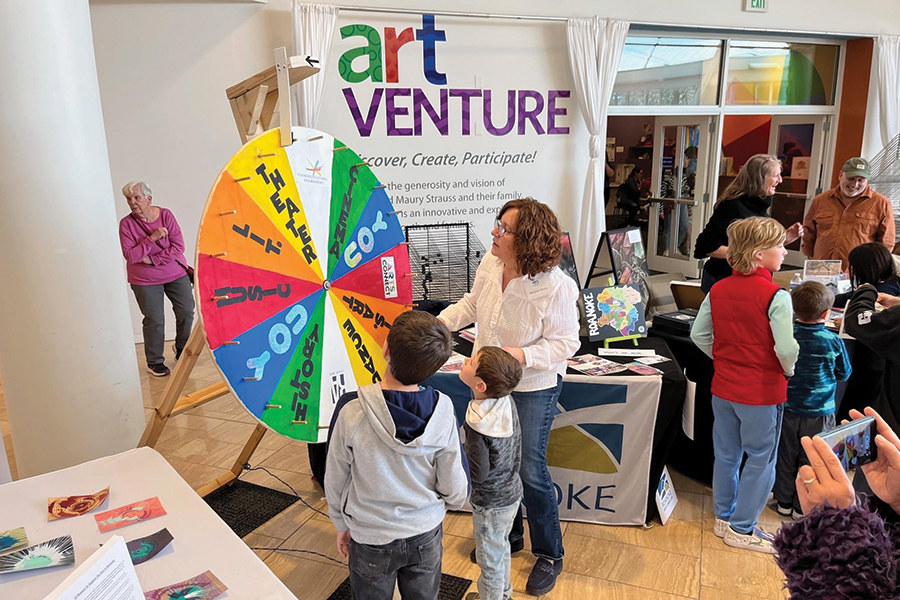 Roanoke Arts Commission Chair Meighan Sharp engages young people in questions about their connections through the arts.