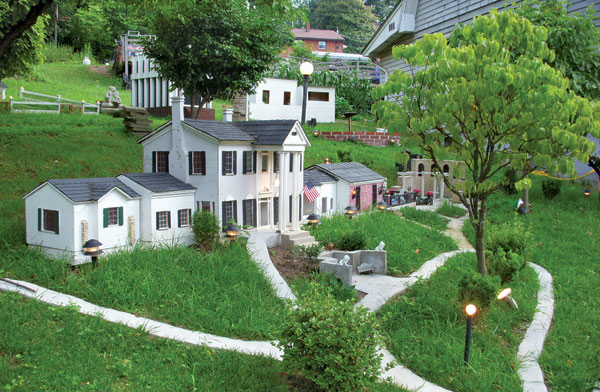 Mike Epperly is in the process of restoring the detailed buildings of the miniature Graceland his father first built in 1987.