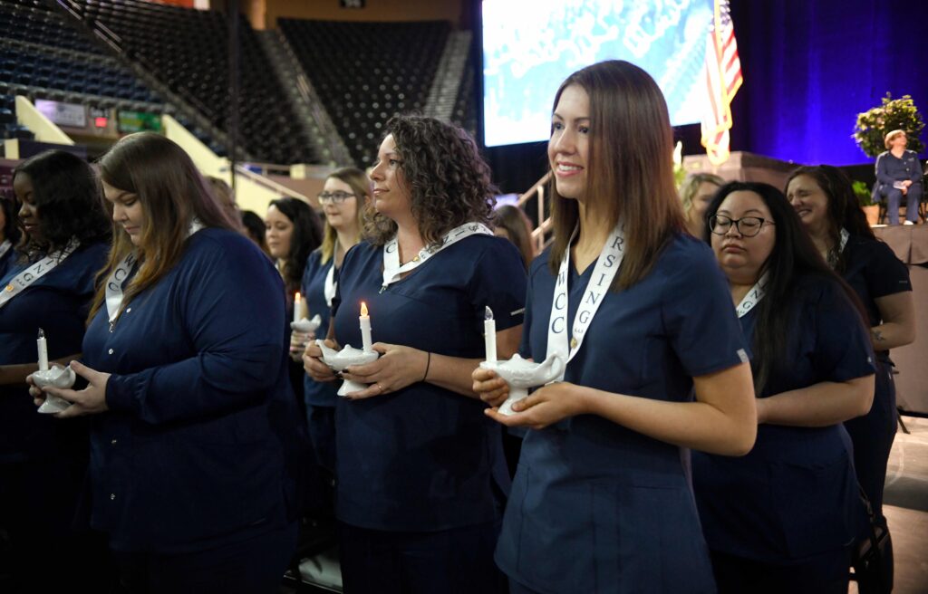 The 2022 cohort of Virginia Western's Nursing Program is honored during the Pinning Ceremony on May 13, 2022, at the Berglund Center. The 2022 graduates were the first to undertake a coaching program to prepare for the NCLEX-RN exam, a requirement to become a Registered Nurse.