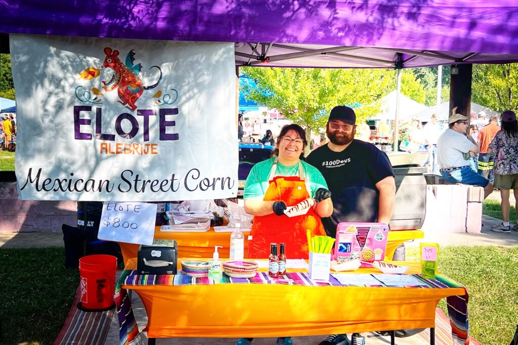 Julia Rigney and Garland Key sell elotes at the Botetourt Honey Festival on August 19.