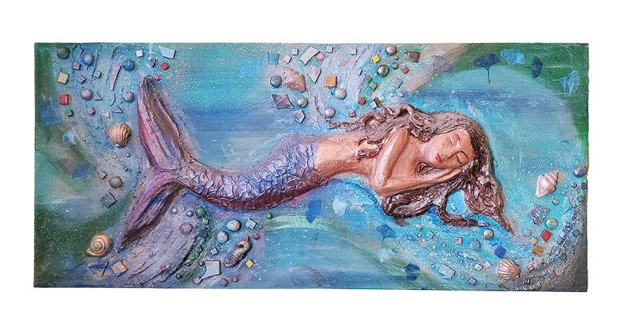 The mixed media mermaid made by Roanoke artist Katherine Devine and thoughtfully gifted to the writer.