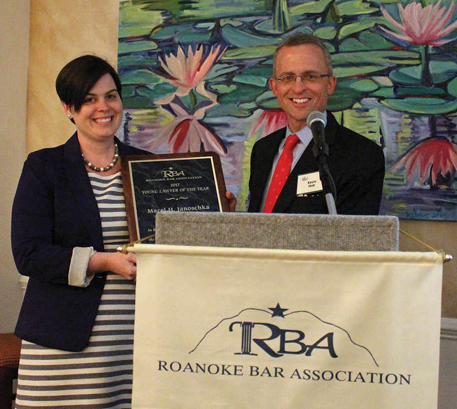 Macel Janoschka receiving the RBA Young Lawyer of the Year Award in 2017 from Kevin Holt (past RBA president).