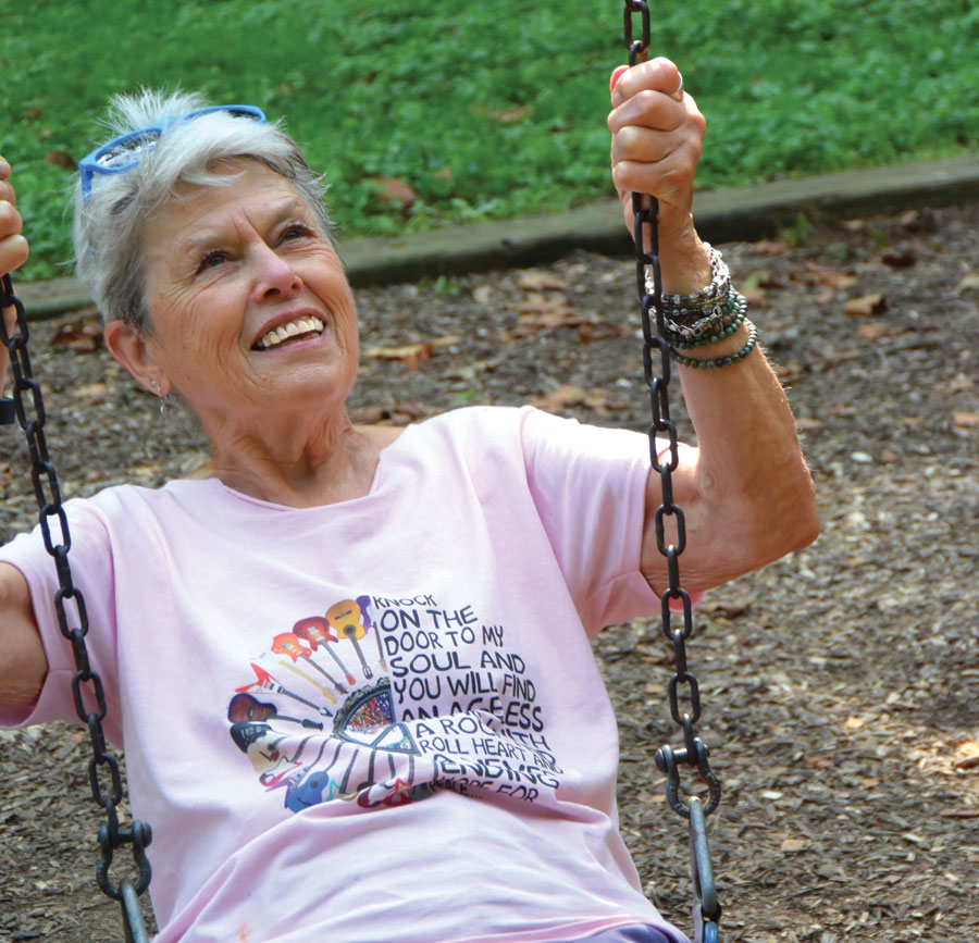 Caryl Connolly enjoys time in one of the neighborhood parks.