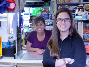 Maddie Price stood on a crate to wait on customers when she was 6.