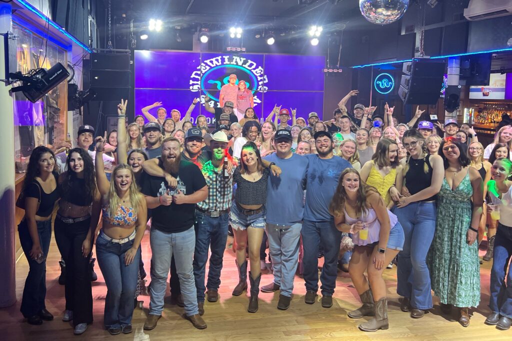 Josh Fugate and Shelby Valade (back, center) with the Thursday night crowd