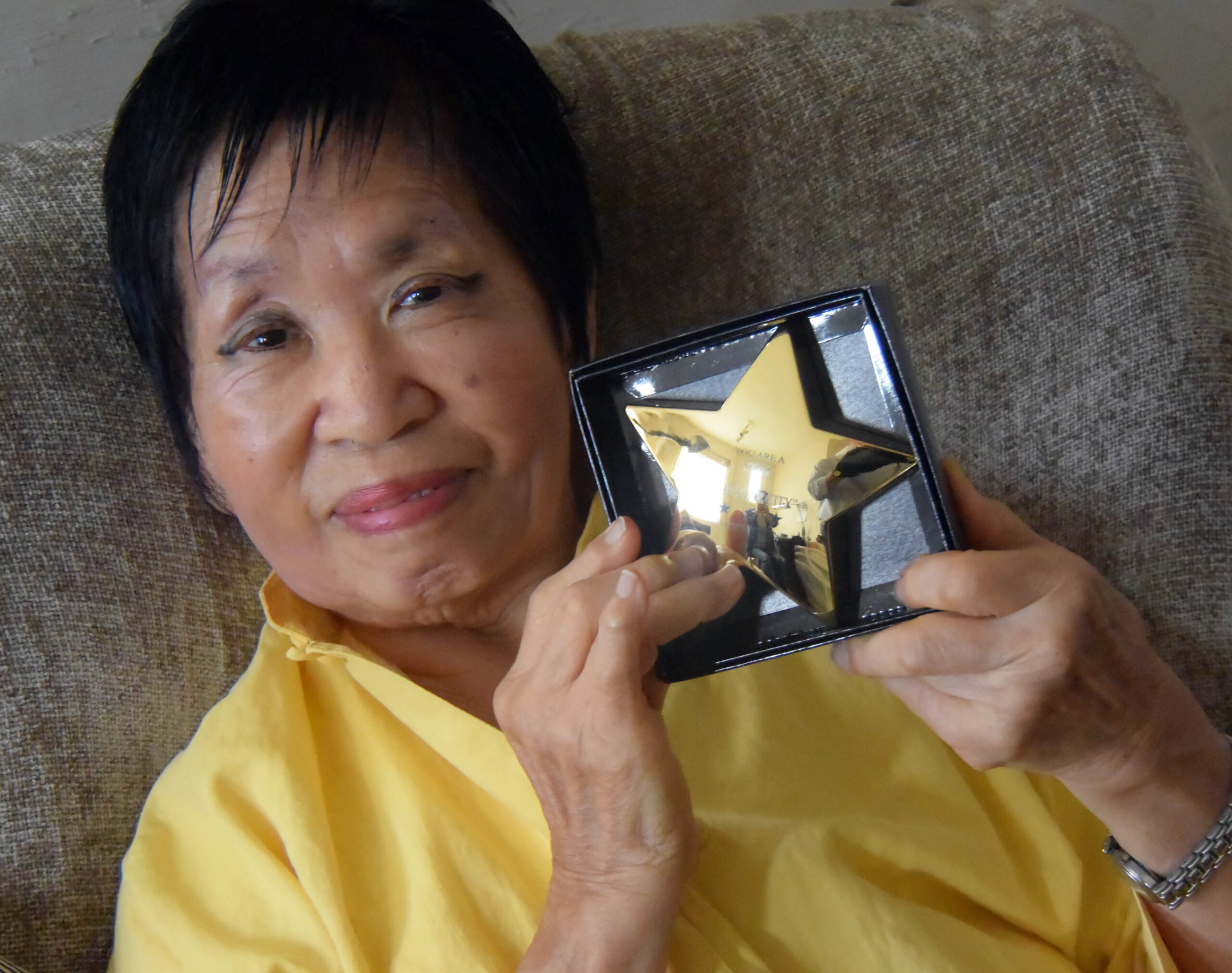 Pearl Fu with her gold star from the city.