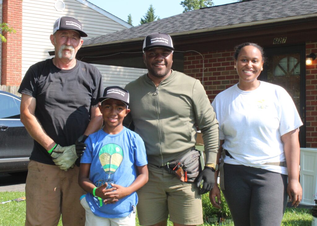 Sheriff Antonio Hash with community volunteers .