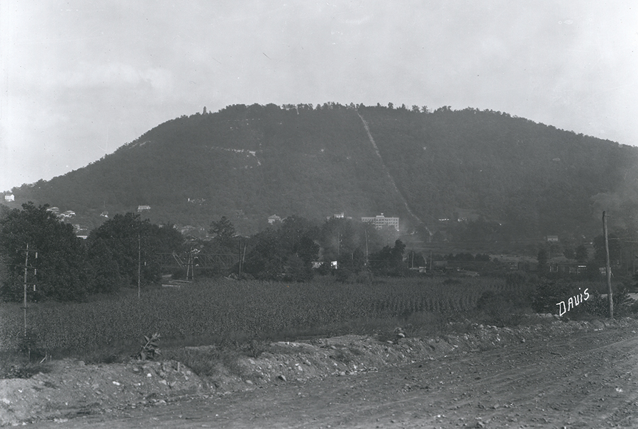This 1920s image shows Mill Mountain with the observation tower on its summit. Courtesy of the Virginia Room, Roanoke Public Libraries