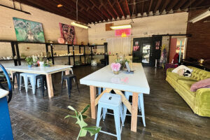 Pops of color and cozy furniture pieces make it hard to believe that Motel Studios is housed in a true commercial space.