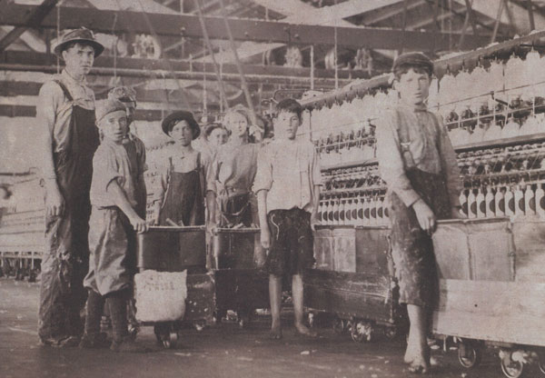 Doffers and Spinners
Hine wrote on back of the photo, “I counted seven apparently under fourteen and three under twelve years old.”