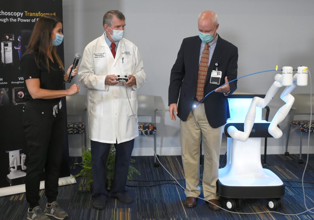 Nelson Greene, MD, conducts a robotic bronchoscope simulation.