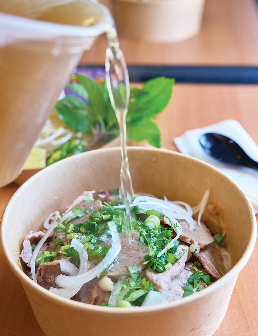 Beef pho, topped with sliced eye of round, brisket and Vietnamese meatballs.