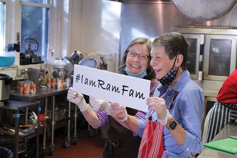 Volunteers serve meals and share their love of the “Ram Fam.”