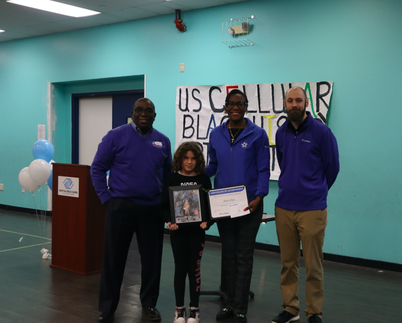 Pictured here from left to right, from UScellular, Bertram Daniels; First Place Winner of the 16th Annual Black History Month Art Contest, Aurelia Stoval, 8 from Rocky Mount and Nakeita Stewart and Darren Chilson from UScellular.
