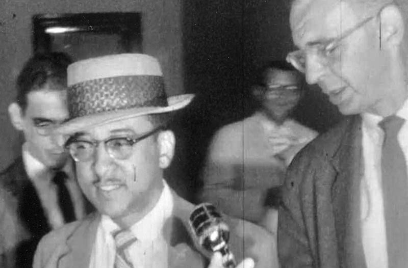 Reuben Lawson (left) is shown leaving a court hearing in 1958.