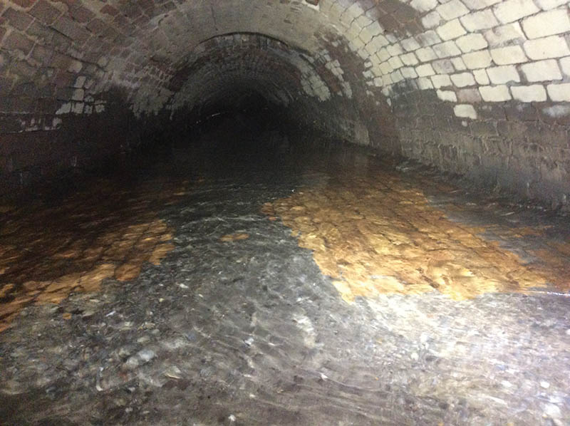 Tunnels like these direct the flow of Trout Run beneath downtown Roanoke.