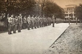 Cadets line up for formation on the front walk of the Harris Military Institute. ©Courtesy of Nelson Harris