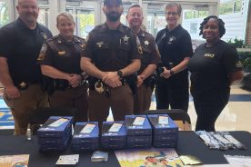 The office held a back to school extravaganza. It parntered with a company that helped provide free tablets to community members.