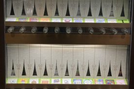 Bread Craft’s Art-O-Mat machine has twenty two slots, one for each artist represented.