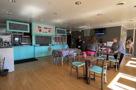 Kona Koffeehouse welcomes guests with its bright and inviting space.