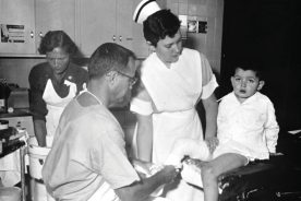 Memorial and Crippled Children’s Hospital (now Carilion Roanoke Memorial Hospital) physician, Dr. Louis Ripley, works with a patient who had corrective surgery for polio around 1950.
