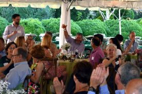 Dr. Dave Trinkle of Roanoke raises his glass to celebrate his winning bid during the Blue Ridge Land Conservancy’s 2019 Conservation Celebration & Auction.