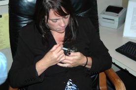 The Roanoker advertising services manager Jenny Dorsey feeding a rescued kitten.