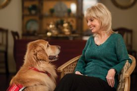 Carol Willoughby, shown with her service dog Midas, co-founded St. Francis Service Dogs, an organization that helps place professionally trained dogs with disabled children and adults.