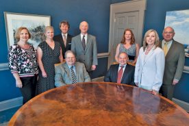 Is Dixon Hubard, Feinour & Brown the Roanoke Valley's best corporate-giving company? 
The generous staff: Seated, from left: Stebbins Hubard, Jonathan Grace. Standing, from left: Becky Fritts, Jean ReMine, Walter ("Watt") Dixon III, Whitney Brown, Tracy Snyder, Angie Carroll, Ted Feinour. Not in the photo: Walter Dixon, Jr.