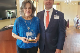 Left to Right:  Louann Howell (2022 Volunteer of the Year), Joe Hoff (President and CEO of Friendship)