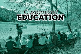 Brittany McPherson leads story time with Valley Forest School students during their field trip to Carvins Cove.